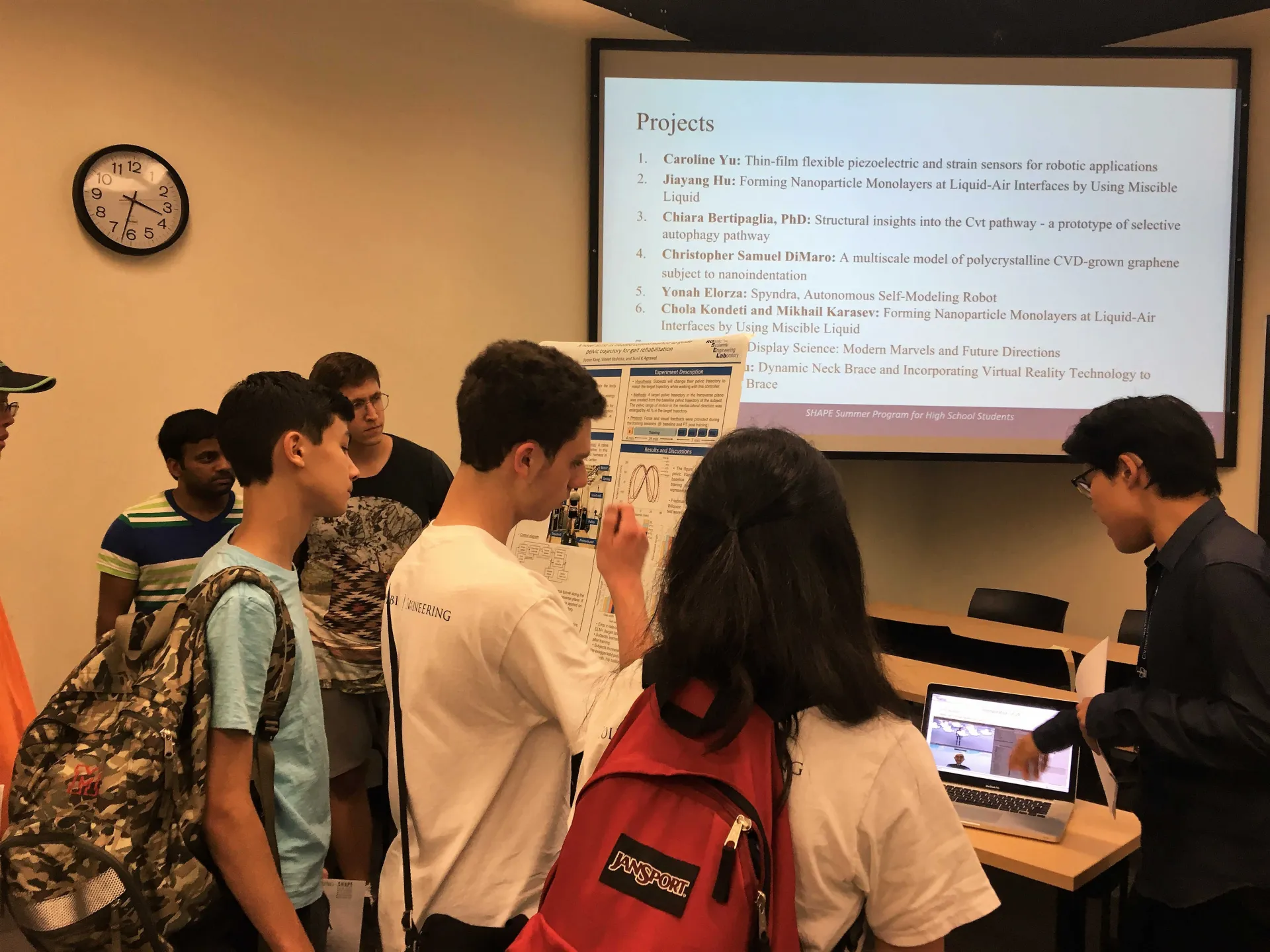 Undergraduate researchers presenting